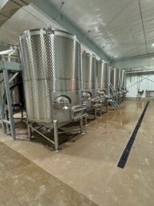 900 and 1200 gallon custom stainless cellar tanks